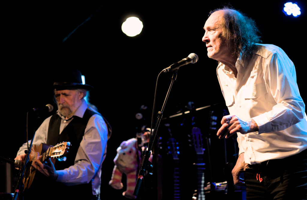 John Otway looking skeptical with Wild Willy Barrett playing in the background.